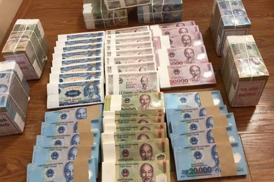 Đổi tiền lẻ kiếm lời dịp Tết có thể bị phạt đến 80 triệu