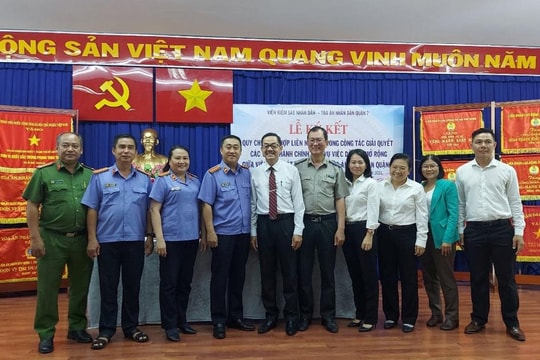 TAND và VKSND quận 7, TP.HCM ký kết quy chế phối hợp công tác