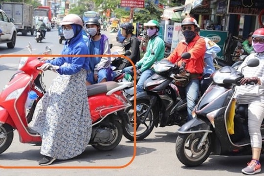 Ngã lún cột sống vì áo chống nắng cuốn vào bánh xe