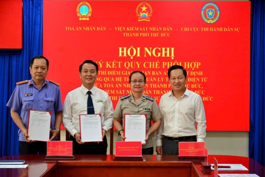 Ký kết Quy chế phối hợp thí điểm giao nhận bản án, quyết định thông qua hệ thống quản lý tài liệu điện tử