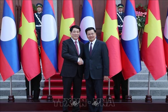 Lễ đón chính thức Chủ tịch nước Lương Cường thăm cấp Nhà nước đến Lào