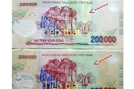 Người dân cần cảnh giác với tiền giả mệnh giá 200.000 đồng