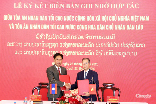 Ký kết biên bản hợp tác giữa TANDTC hai nước Việt Nam - Lào
