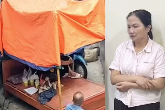 Khởi tố người phụ nữ mang đồ vật chặn lối đi chung