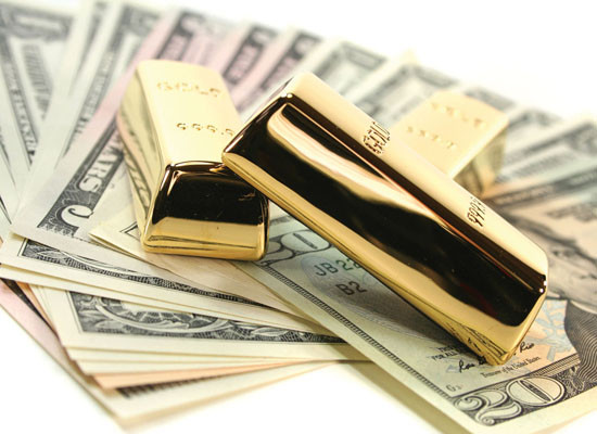 Vàng giảm giá, đồng USD hạ nhiệt ngày đầu tuần