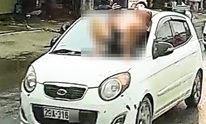 Khởi tố bố vợ và con rể trong vụ nằm lên nắp ca pô khi ô tô đang chạy