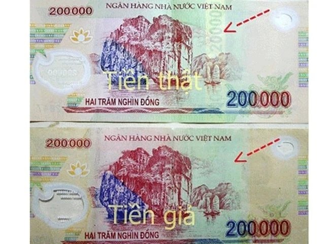 Người dân cần cảnh giác với tiền giả mệnh giá 200.000 đồng